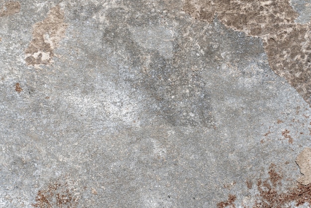 Monohrome dark grunge gray abstract background. Grunge old wall texture, concrete cement background. Large gray concrete wall, weathered by age