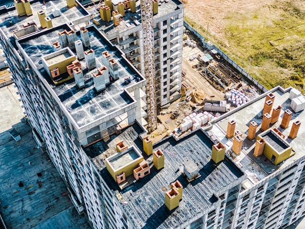 Monolithic frame construction of the building Solid walls of concrete Shooting from a drone Modern construction of a residential building construction site close up View from above