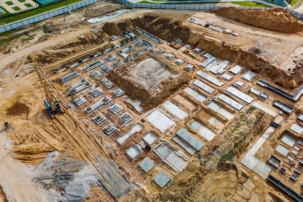 Monolithic reinforced concrete foundations or grillages for the construction of a large modern residential building Rostverk at the construction site Foundation for the building View from above