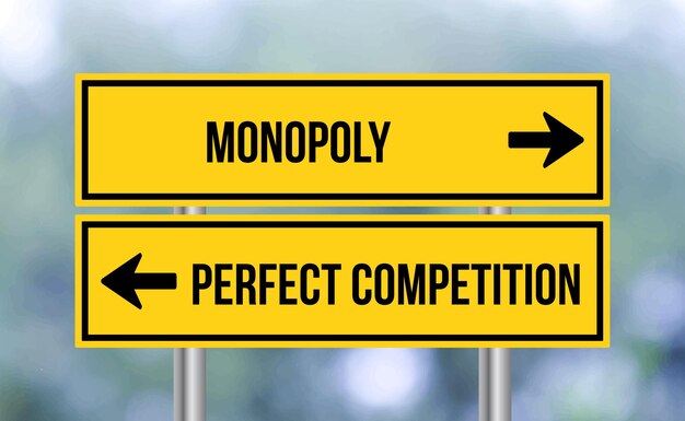 Monopoly or perfect competition road sign on blur background