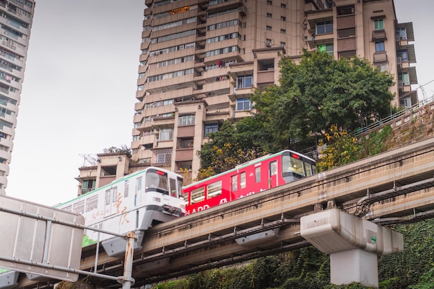 Monorail Metro Passing Through a Residential Buildings