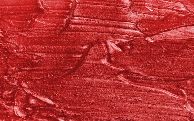 Monster van rode glittergel met kleine deeltjestextuur van markeerstiftcosmetica lippenstiftblush