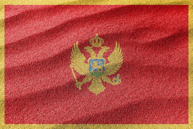 Montenegro sand flag national flag sand background