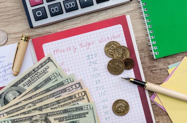 'Monthly budget planning' concept on wooden table