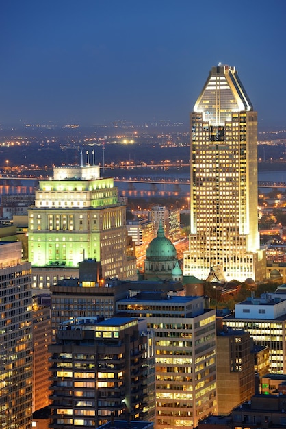 Montreal at dusk with urban skyscrapers viewed from Mont Royal