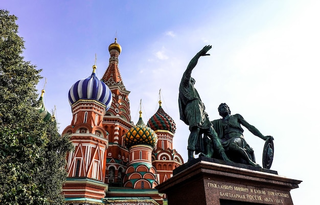 Monument to Minin and Pozharsky and the St Basils Cathedral in Moscow Russia