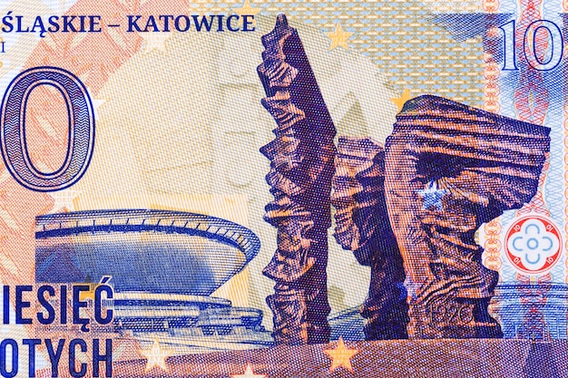 monument to silesian insurgents and saucer in katowice from money