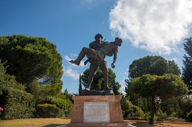 Monument of a Turkish soldier carrying wounded Anzac soldier at Canakkale Dardanelles Martyrs' Memorial Turkey