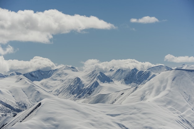 Monumental blue and white mountains in the snow