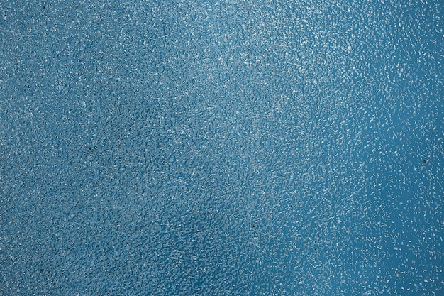 Mooie abstracte grunge decoratieve marineblauwe donkere stucwerk muur achtergrond kunst ruwe gestileerde textu