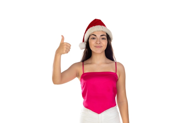 Mooie brunette meisje in Kerstman hoed geïsoleerd op een witte achtergrond met kopie space
