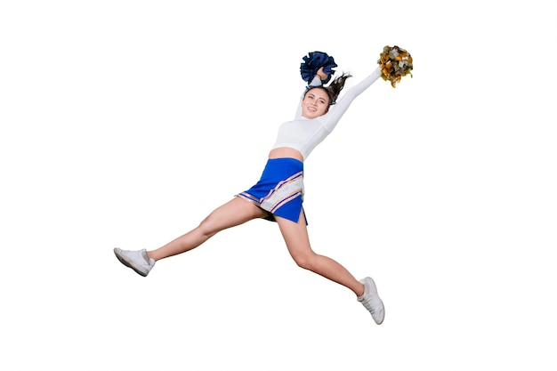 Foto mooie cheerleader pom poms op studio opheffen