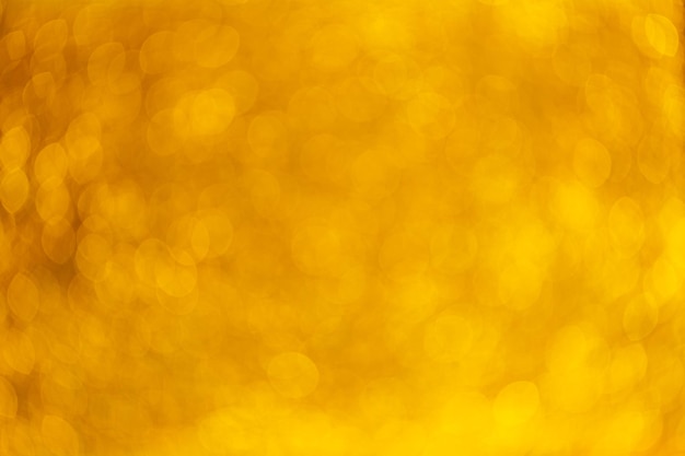 Mooie feestelijke gouden abstracte achtergrond met bokehlichten voor design