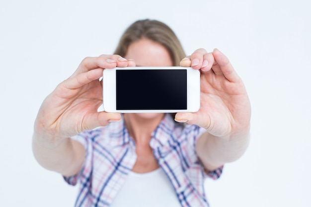 Foto mooie hipster die selfie met smartphone nemen