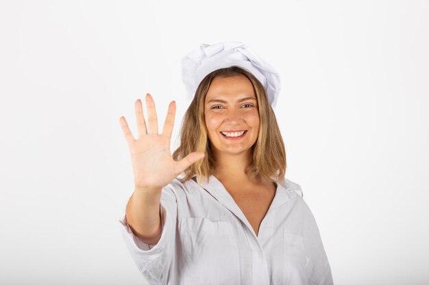 Mooie lachende vrouw chef-kok portret