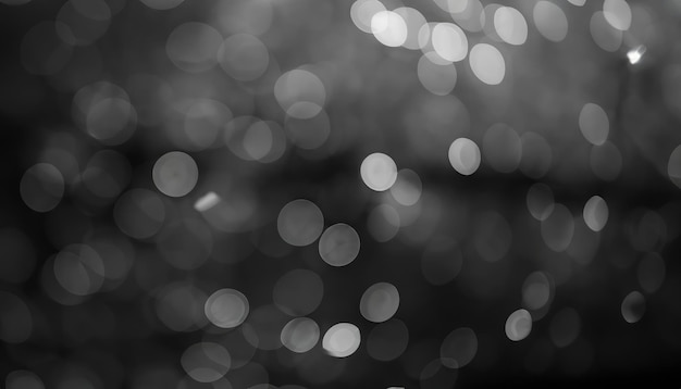 Foto mooie monochrome bokeh vervaagde achtergrond met ontfocuste lichten