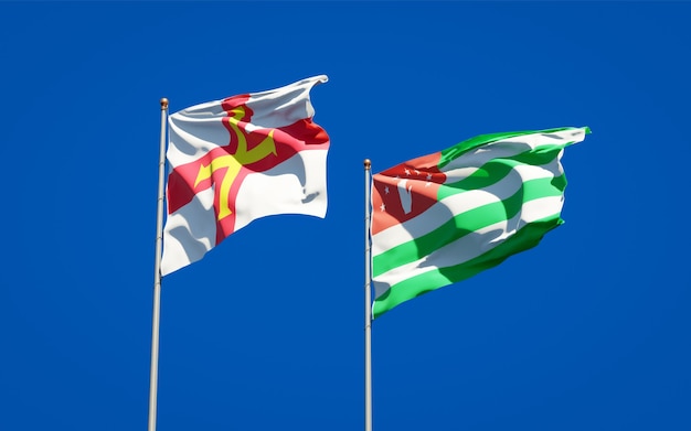 Mooie nationale vlaggen van Guernsey en Abchazië samen