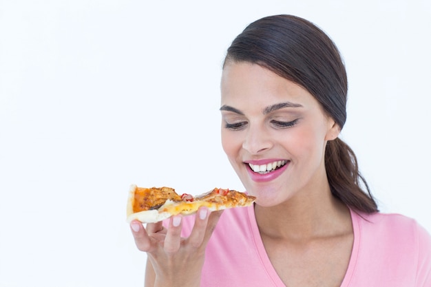 Mooie vrouw die een pizza eet