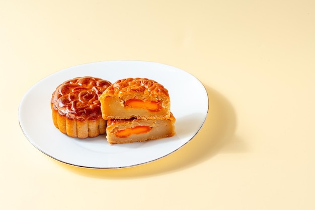 A mooncake is a Chinese bakery product traditionally eaten during the MidAutumn Festival