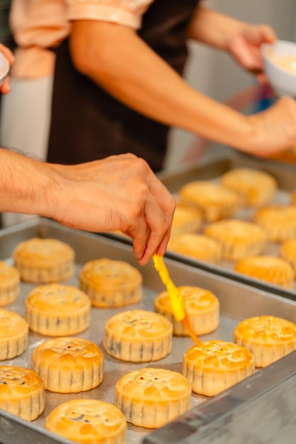 Mooncake making process A mooncake is a Chinese bakery product traditionally