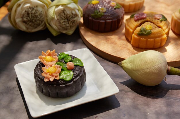 Mooncake Moon cake for MidAutumn Festival concept of traditional festive food on wooden table