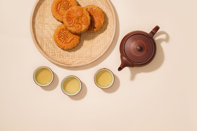 mooncakes,which are vietnamese pastries traditionally eaten during the mid-autumn festival. translation on round moon cake "mid autumn".