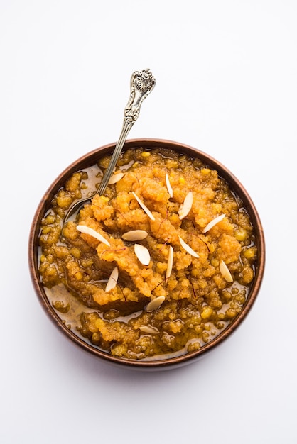 Moong dal halwa is a classic Indian sweet dish made with moong lentils, sugar, ghee and cardamom powder