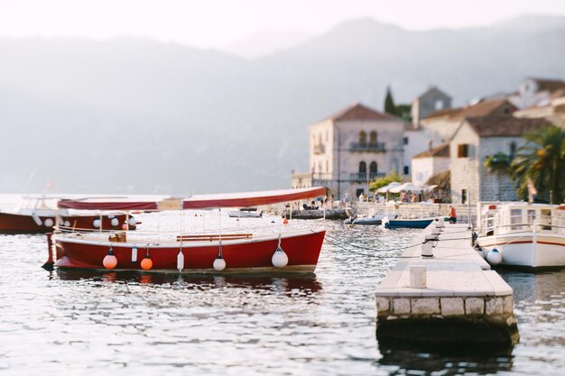 Moored fishing boats at the pier perast montenegro