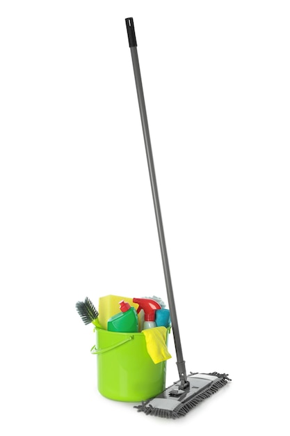 Mop and plastic bucket with different cleaning supplies on white background