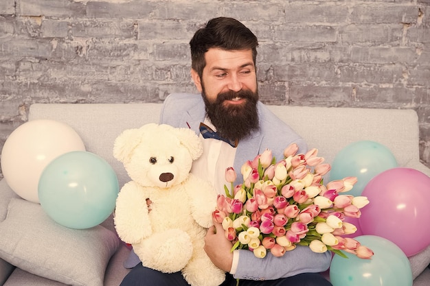 More than words womens day flower bouquet for march 8 love bouquet international holiday happy bearded man with tulip bouquet bear spring gift bearded man hipster with flower bouquet