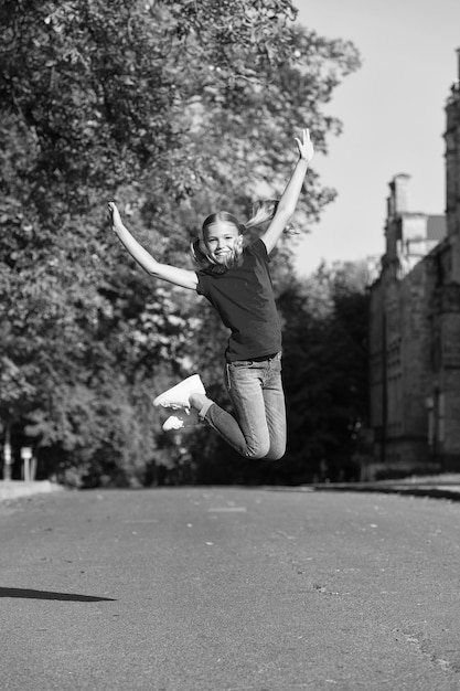 Do more of what makes you happy Happy child jump high outdoors Happy childhood Having fun Raising happy kid School holidays Summer vacation International childrens day