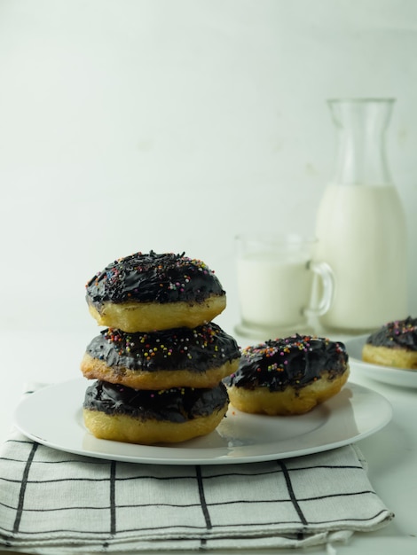 Morning breakfast with donuts and milk