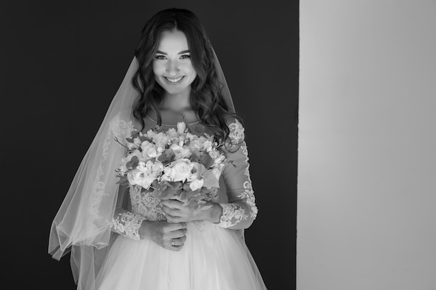 Morning of the bride. Preparing the bride for the upcoming wedding. Portrait of a girl.