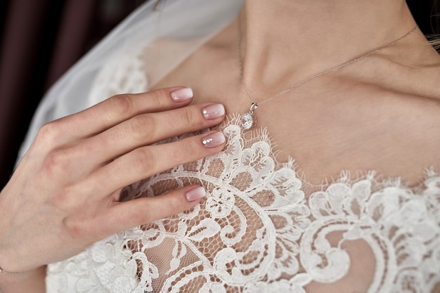 Morning of the bride when she wears a beautiful dress, woman getting ready before wedding ceremony