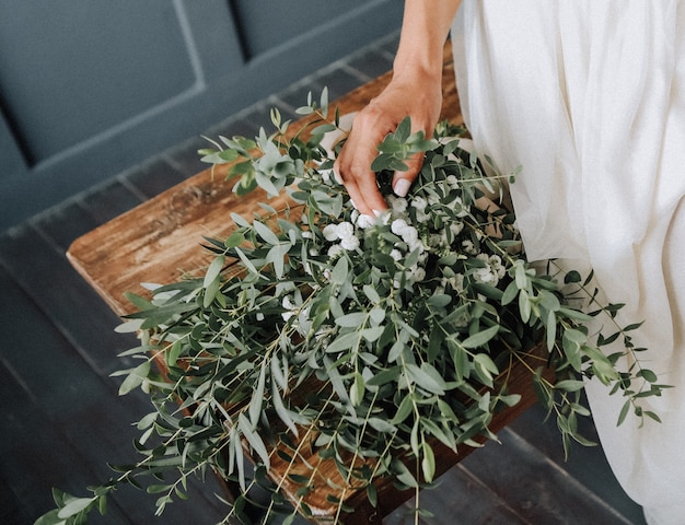 Morning of the bride with a bouquet