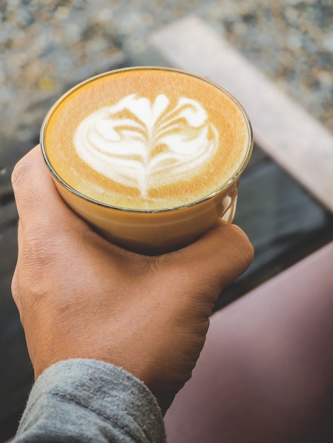 Morning coffee latte in a clear glass.