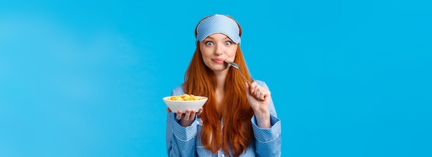 Morning lifestyle and women concept pretty cute redhead foxy girl with long red hair wakingup early