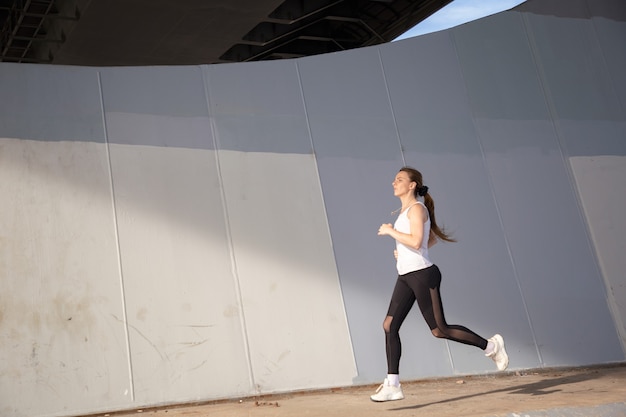 Morning run of a young woman