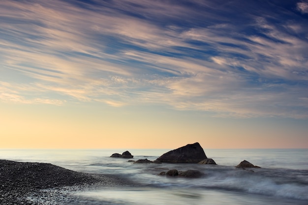 Morning sea landscape with a cloudy sky