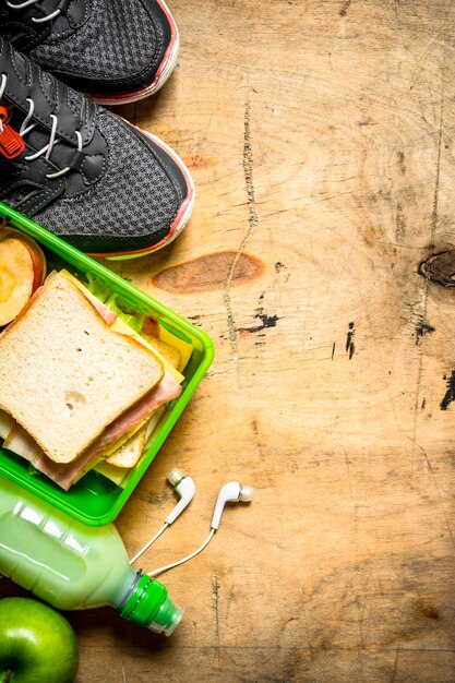 Morning set Sandwiches with ham and cheese, a milkshake and fruit