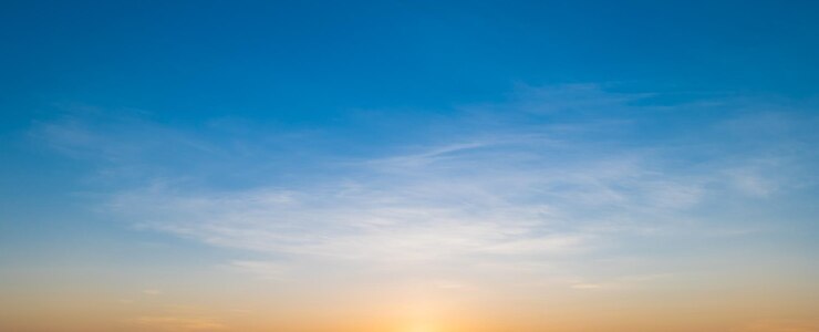 Morning sky scene with a bright golden light Beautiful sunrise with clouds soft Nature background concept
