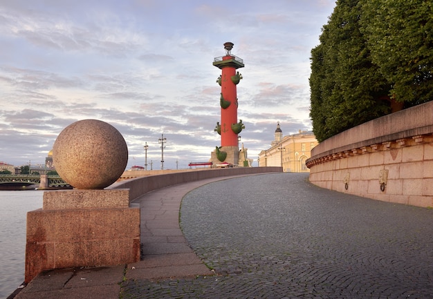 Morning on the spit of Vasilievsky island View of the Rostral column granite parapet