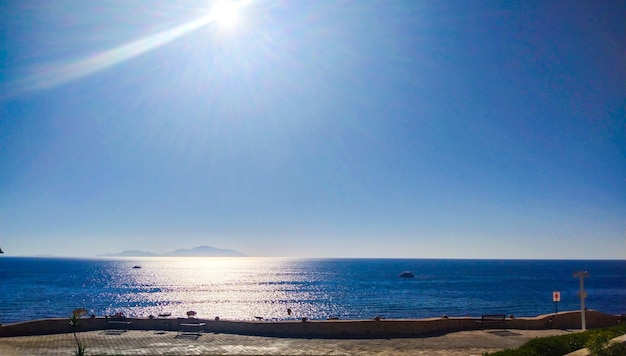 Morning sun over the sea. Morning calm on the coast. Beautiful seascape