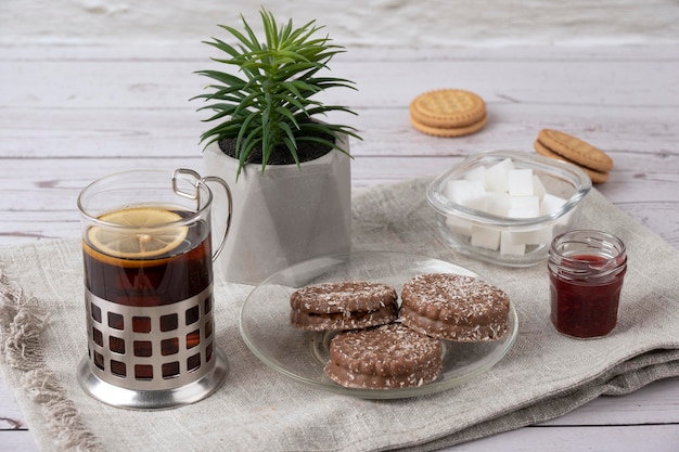 Morning tea and cookies on the table in the kitchen