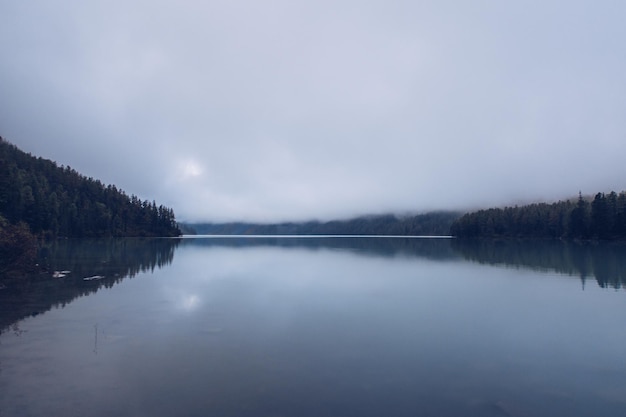 Morning view foggy Kucherla mountain lake. Belukha national park, Altai republic, Siberia, Russia