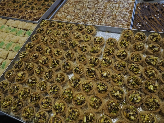 Moroccan biscuits and pastries dipped in honey for sale in the Medina of Fes in Morocco