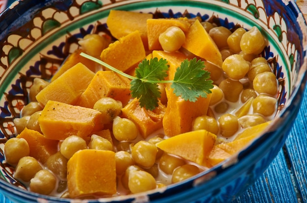 Moroccan cuisine, Chickpea Squash Tagine, Traditional assorted Moroccodishes, Top view.