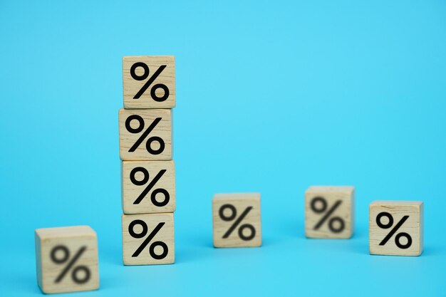 mortgage rate concept block cube rising top with upward direction percentage symbol icon