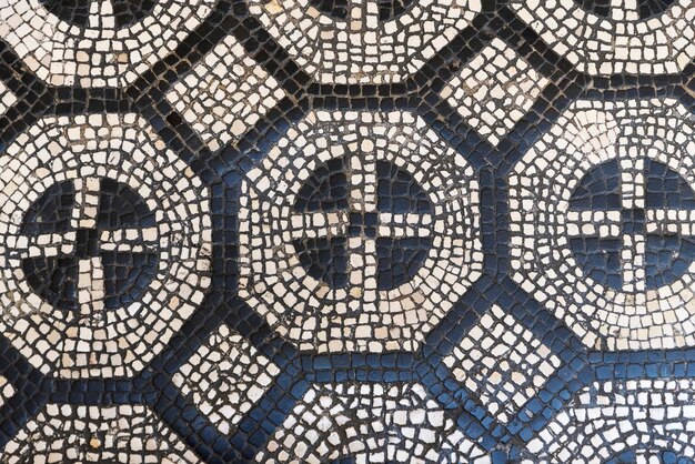 Mosaic on the floor in the shape of a cross