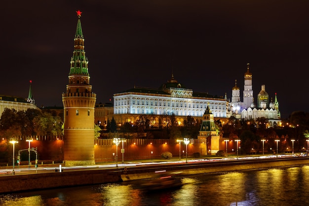 Moscow Kremlin with night illumination against Moskva river